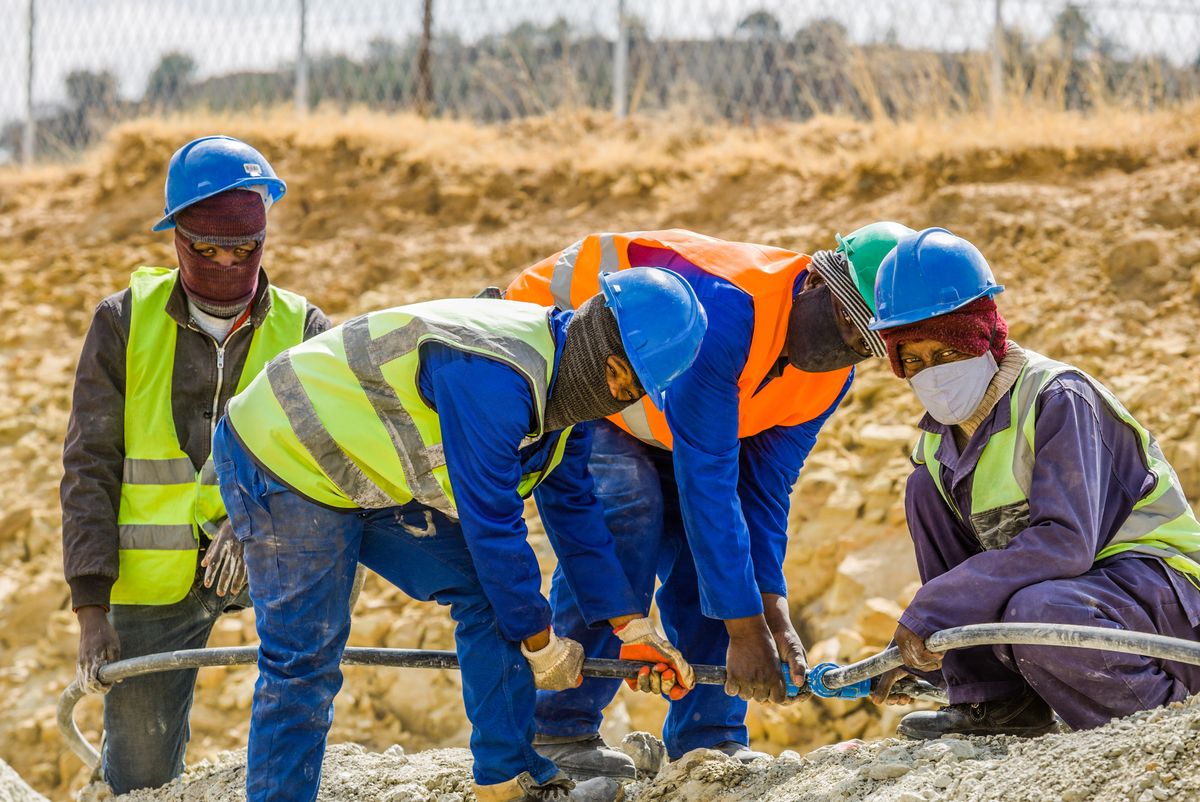 Everest Drilling team members at a borehole site in South Africa