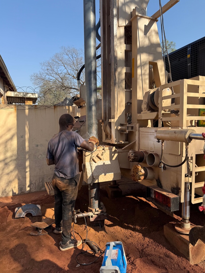 Everest Drilling rig actively drilling a borehole
