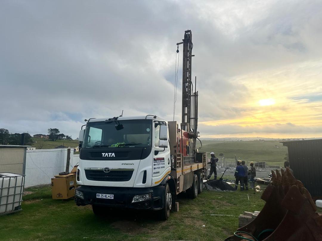 Everest Drilling heavy-duty rig on site at sunset